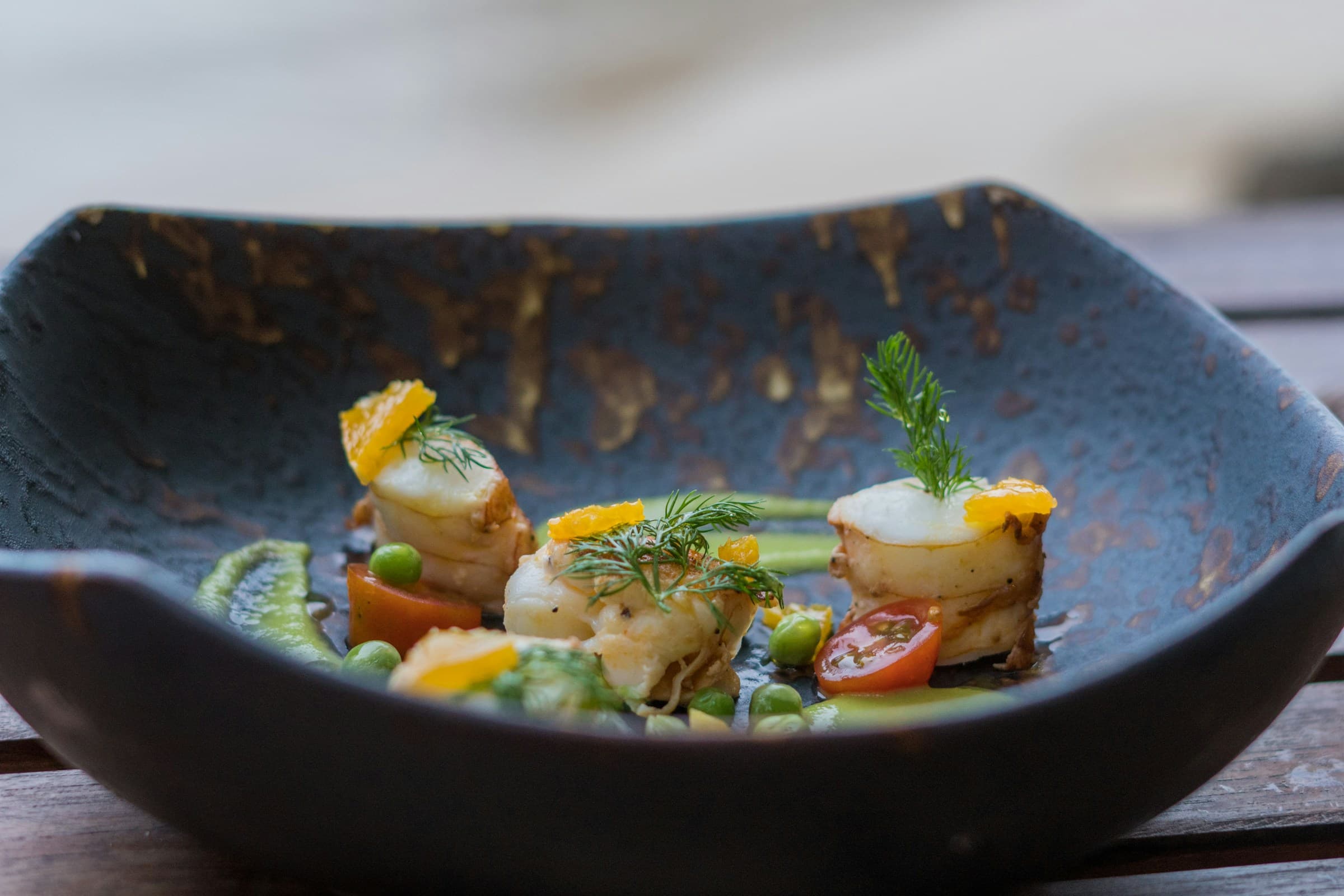 Scallop in brown butter dashi with celery leaves